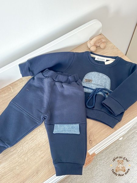 طقم فوتر مع رسمة طاقية